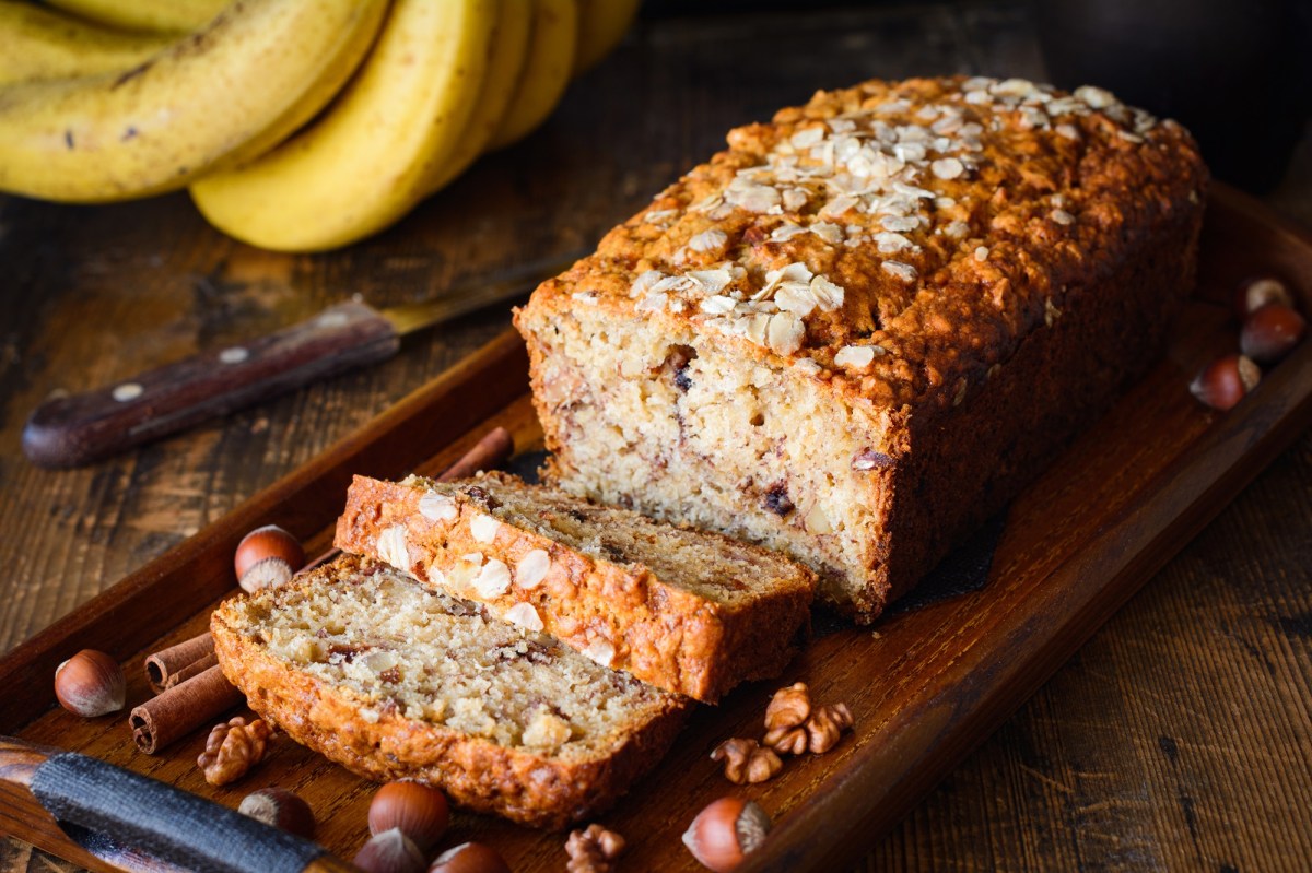 Sliced oat and banana bread on a board