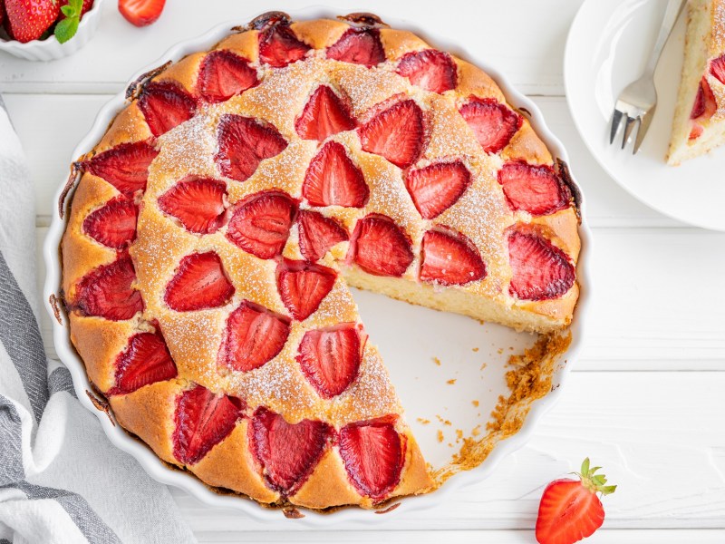 Fresh strawberry yogurt cake on a table