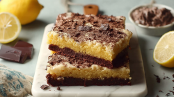 Several pieces of chocolate lemon sheet cake.