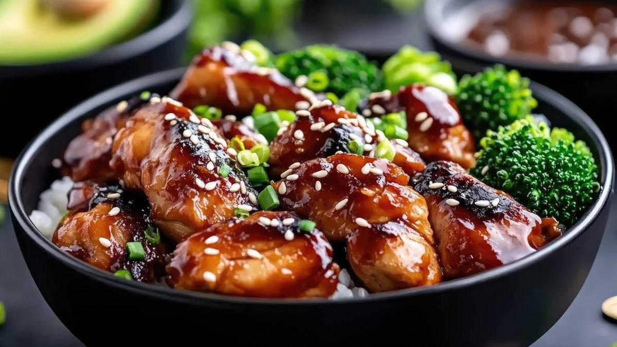 Bowl of oven-baked teriyaki chicken with steamed broccoli