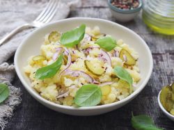 Smashed Potato Salad, served in a nice bowl.