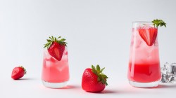 2 glasses of Aperol Strawberry Spritz garnished with strawberries