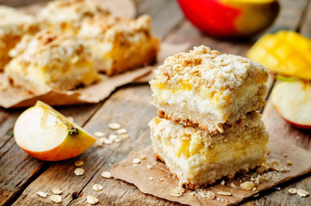 Two apple-mango bars on an autumnally decorated table.