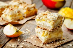 Two apple-mango bars on an autumnally decorated table.